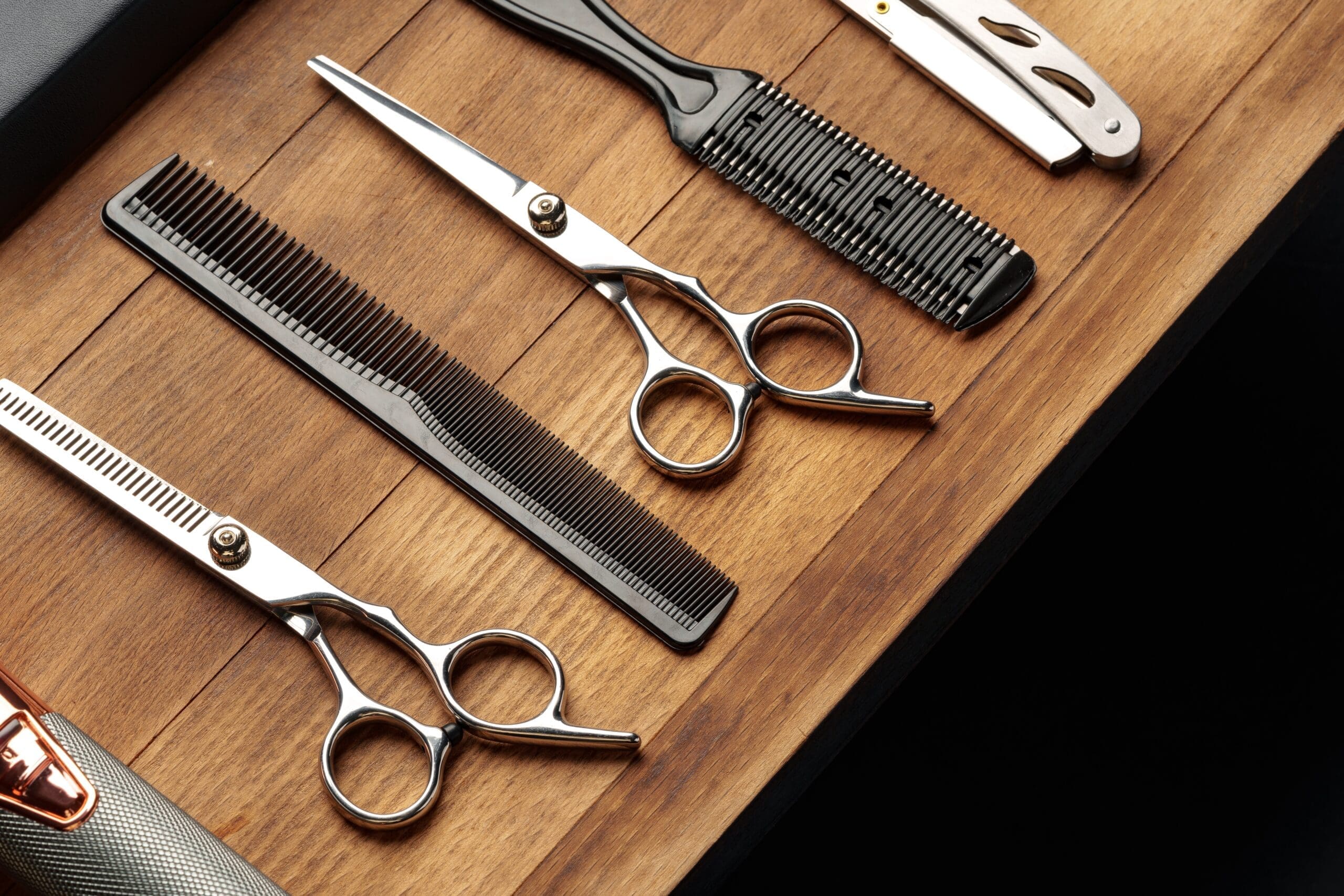 Professional,Barber,Tools,Laid,Out,On,Wooden,Surface,For,Mens